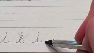 Lowercase "i" in cursive