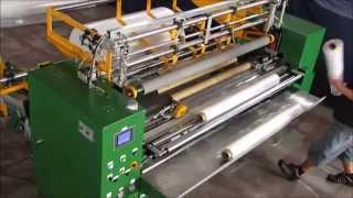 Jumbo Roll to Roll Re-winder with Shaft-less Core Changing System