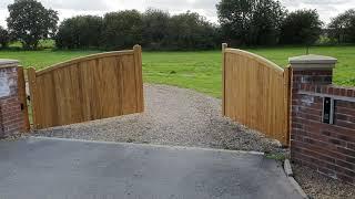 Hardwood driveway gates autoclosing automation