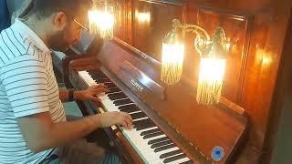 During the visit of the great Pianist Ashraf Rizk to my Showroom  and plays  an improved Piece