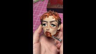 sculpture of lee in bones and all