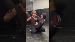 Women spar during Jiu Jitsu training!..