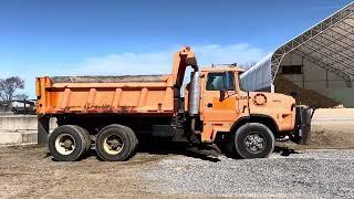 Ford L9000 dump truck selling at John Peck Auctions