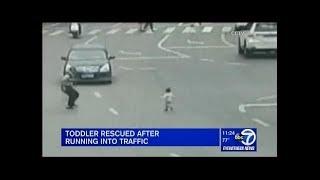 2yr Old Toddler Rescued After Running Out Into Heavy Traffic