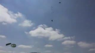 Raining Humvees! Military Vehicles Fall To The Ground In Failed US Airdrop