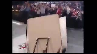 Dudley Boyz throw Spike Dudley through table