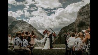 Banff Wedding at Tunnel Mountain Reservoir with bride and groom who dance down the aisle