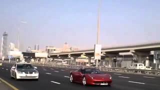 The procession of luxury cars in Dubai.