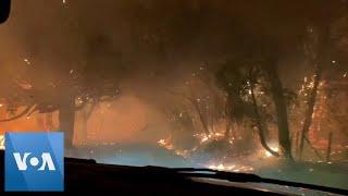 Car Drives Through Northern California Wildfire