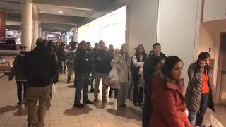 See line of shoppers waiting for Best Buy to open at Destiny USA