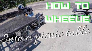 MOTORCYCLE WHEELIES INTO PICNIC TABLE | FAIL