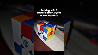 Solving a 3x3x3 Rubik's cube in just a few seconds #ytshorts #rubikscube #rubiks_cube_solve_trick