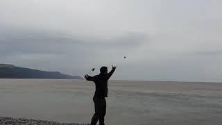 IronGoober, ArchaicArms and Acroballistics sling stones at the beach (Slinging 960 frames/sec)