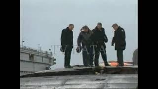 High-ranking military examining the top of #Kursk submarine #tvdata Russian naval base shipyard