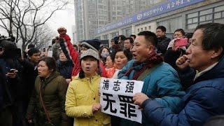 Scuffles as Chinese rights lawyer stands trial