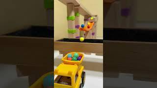 The marbles jump into the dump truck. #marblerun #marblesrace #marble