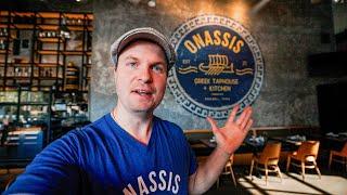 Restaurant Owner Serves Tables in his own restaurant.