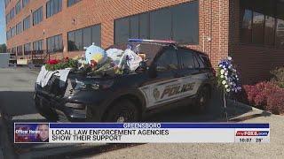 Triad law enforcement agencies show support for Greensboro police by helping with funeral for Office