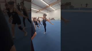 Floor routine. Gymnastics practice