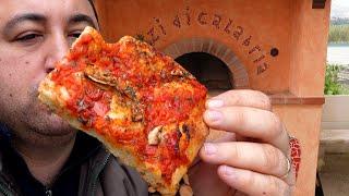 Pizzas and Homemade Bread in the Wood Oven in Calabria