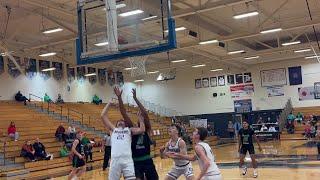 Cloverdale Freshman Ishael Kiteka with the board, bucket and foul vs Robinson