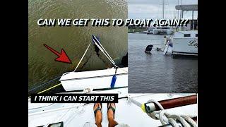 Raising a sunken boat from Debby