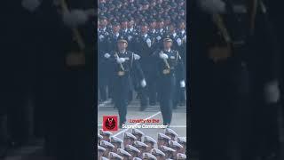An elegant parade with rhythmic salutes and raised arms