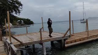 THE BEAUTY OF ST. VINCENT AND THE GRENADINES: MUSIC, CAPTAIN LANO'S BAR AND A VIEW OF YOUNG ISLAND