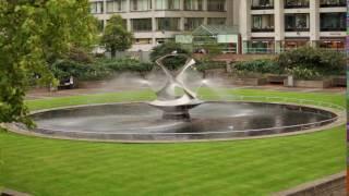 Stationary view of Revolving torsion Fountain Sculpture in London, England.