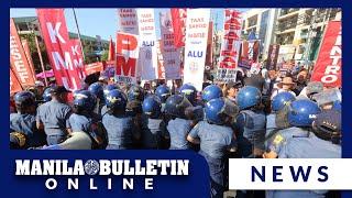 QCPD blocks Kilusang Mayo Uno as they protest for wage increase