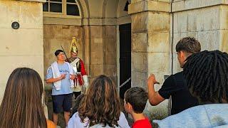 RUDE IDIOT GERMAN STUDENTS THROW GANG SIGNS AS THEIR FRIENDS LAUGH at Horse Guards!