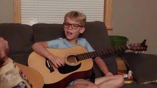 How to teach an 8 year old to play guitar