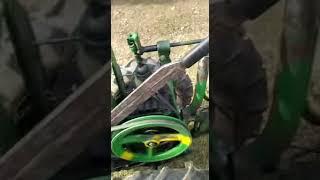 Belt clutch engagement on a homemade tractor