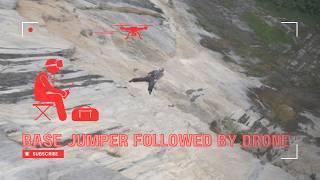 Raw Clip of Drone Chasing Base Jumper!