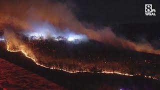 Brush fire continues to burn on mountain in Berks County