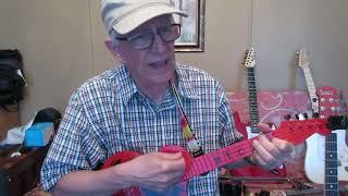 Playing an Original Song on My Red Concert Ukulele.  RICH!