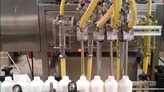 4 Nozzle Liquid filling machine | Stillpack Machines, Hyderabad