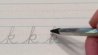 Lowercase "k" in cursive