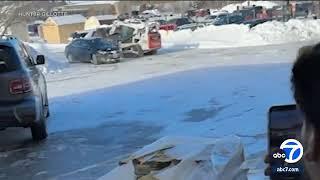 Video shows man go on rampage with Bobcat tractor in Nebraska parking lot