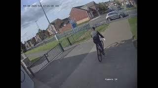 A thief steals a bike outside Hillside Neighbourhood Centre in Hillside Ave Huyton