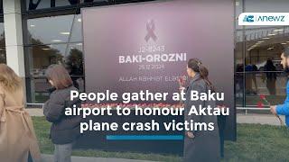 People gather at Baku airport to honour Aktau plane crash victims