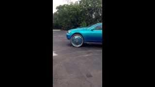 Kandy teal BMW 750 on 30s DUB SWYRLS