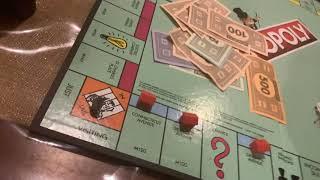 Playing Monopoly around the house.