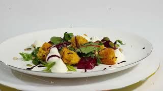 Salad with herring, beetroot, paprika, red onion, mustard and balsamic vinegar. Salad of lettuce