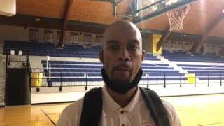 Central coach Aaron Daniels talks with Barry Lewis after a dramatic comeback win in a 4A playoff