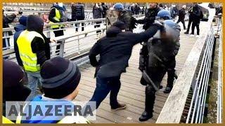  France: Video of former boxer punching police officers goes viral l Al Jazeera English