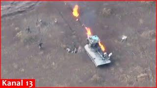 Drone footage shows Russian soldiers trying to escape from burning equipment for salvation