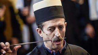 Kosovo Dervishes pierce their mouths in celebration of spring