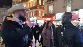 Muslim cowboy meets a Hindu at Leicester Square Speakers Corner Sam Dawah