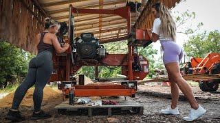 Two Beautiful Blondes Cutting Dimensional Lumber On The Sawmill